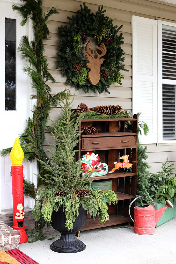 Vintage Porch Corner with Pine Wreath and Deer Head — Christmas Porch Decor
