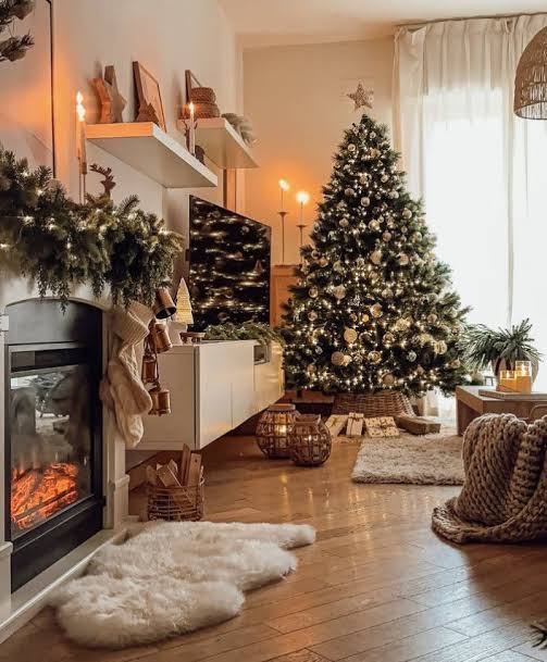 Heavily Decorated Christmas Tree and Lit Fireplace Heavily Decorated Christmas Tree and Lit Fireplace — Cozy Christmas Living Room