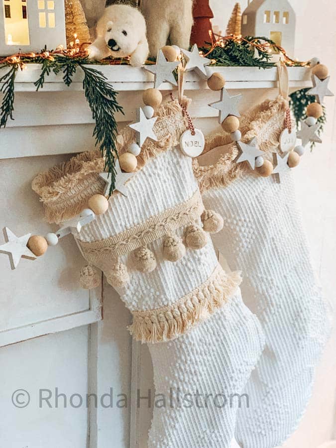 Textured Boho Christmas Stockings with Fringe and Wood Bead Garland — Boho Christmas Decor