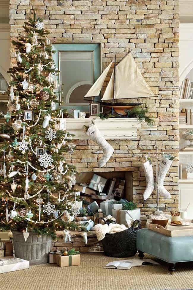 Coastal Christmas Tree by a Stone Fireplace