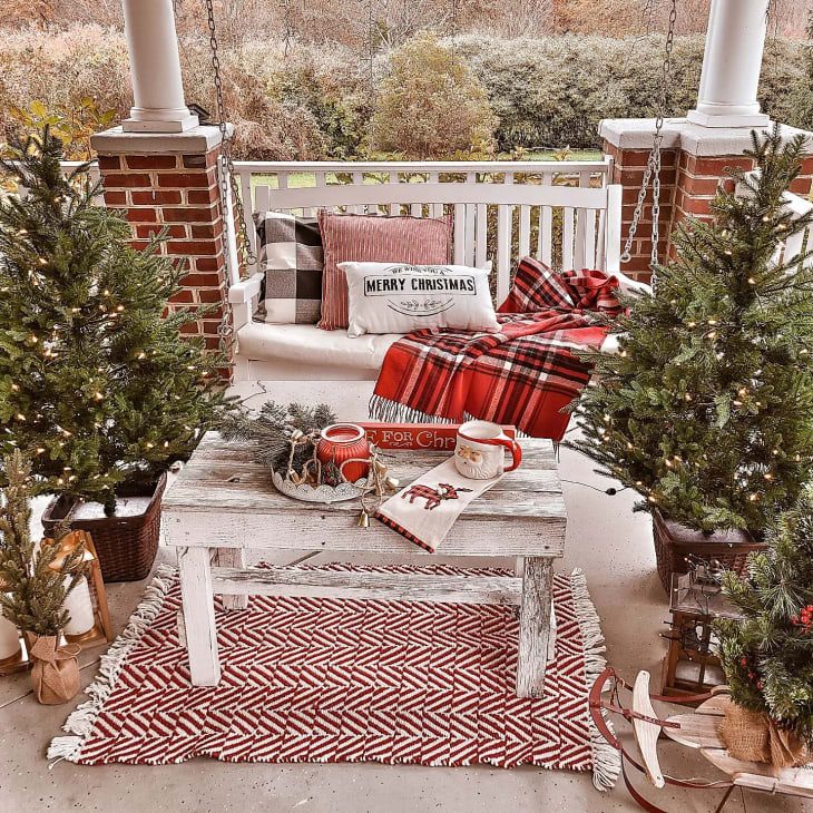 Farmhouse Porch with Plaid Blanket and Rustic Table Decor — Christmas House Exterior Decor