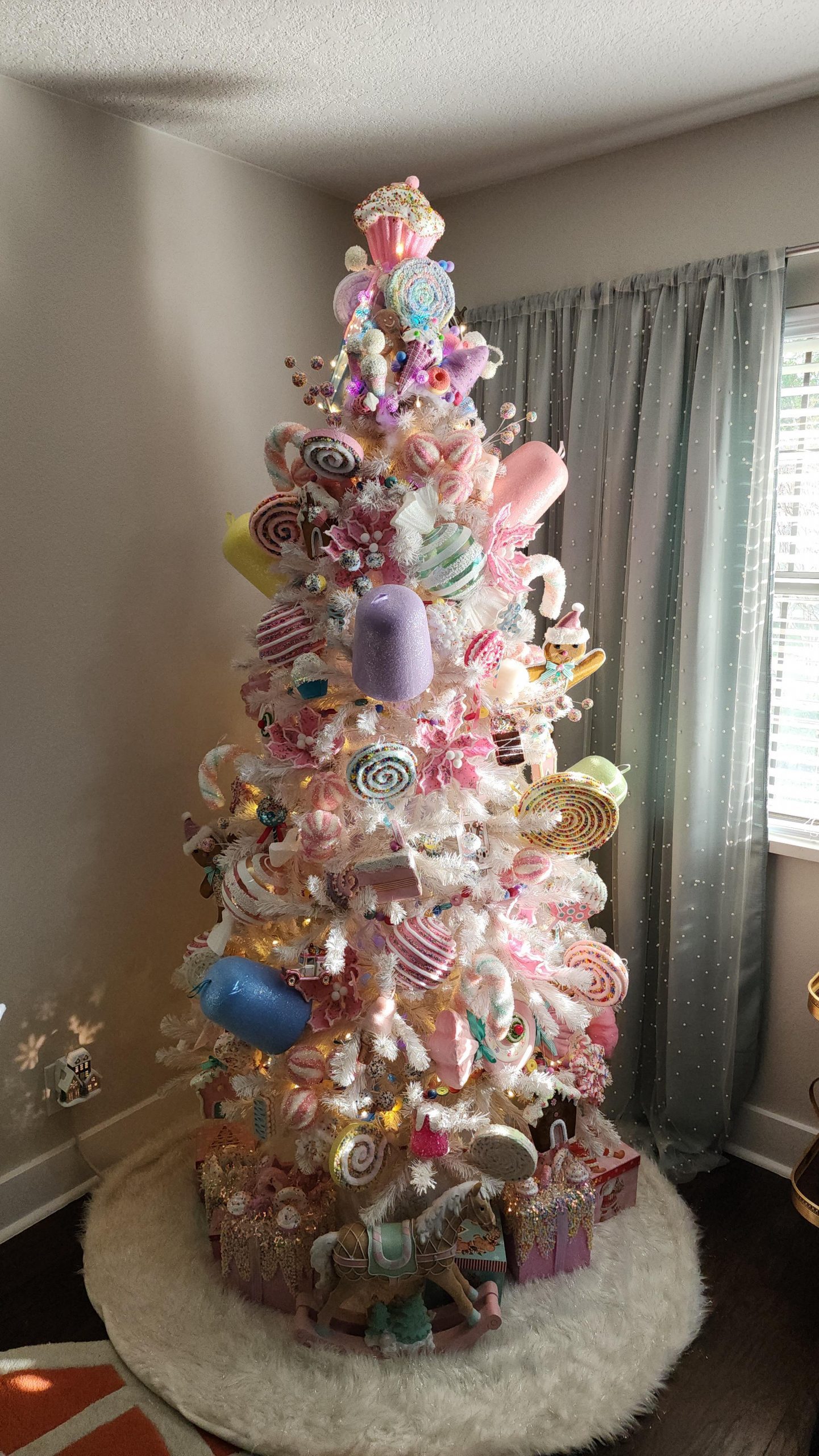 Pastel Candy Ornament Abundance on White Flocked Tree Pastel Candy Ornament Abundance on White Flocked Tree — Candy Land Christmas Tree