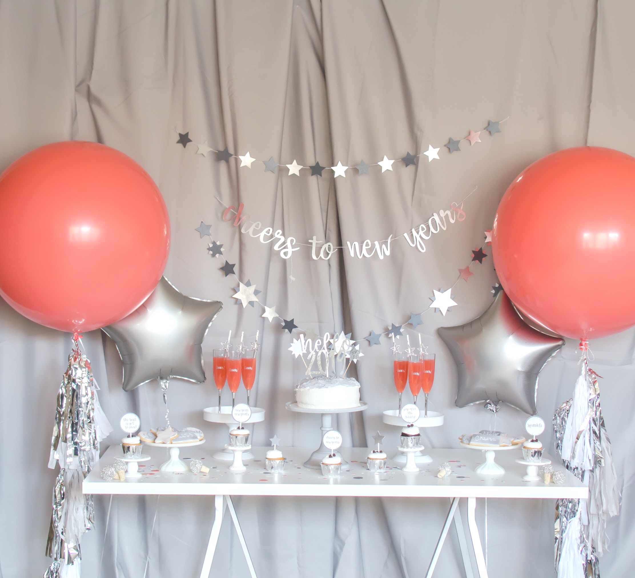 Glamorous Dessert Table with Coral Balloons and Star Accents Glamorous Dessert Table with Coral Balloons and Star Accents — New Years Eve Party 2027
