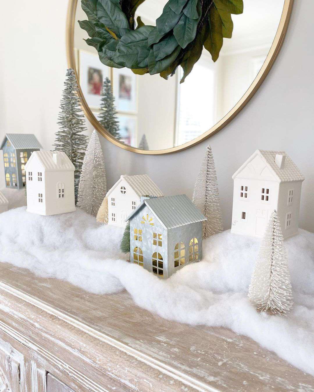 Minimalist White Ceramic Village on a Mantelpiece — Christmas Village Display