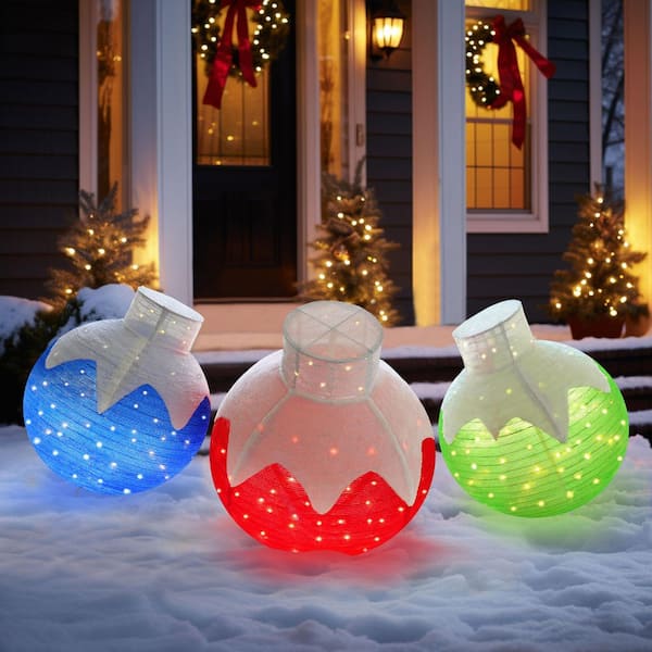 Oversized Inflatable Christmas Ornaments in Blue, Red, and Green Oversized Inflatable Christmas Ornaments in Blue, Red, and Green — Christmas Yard Decor