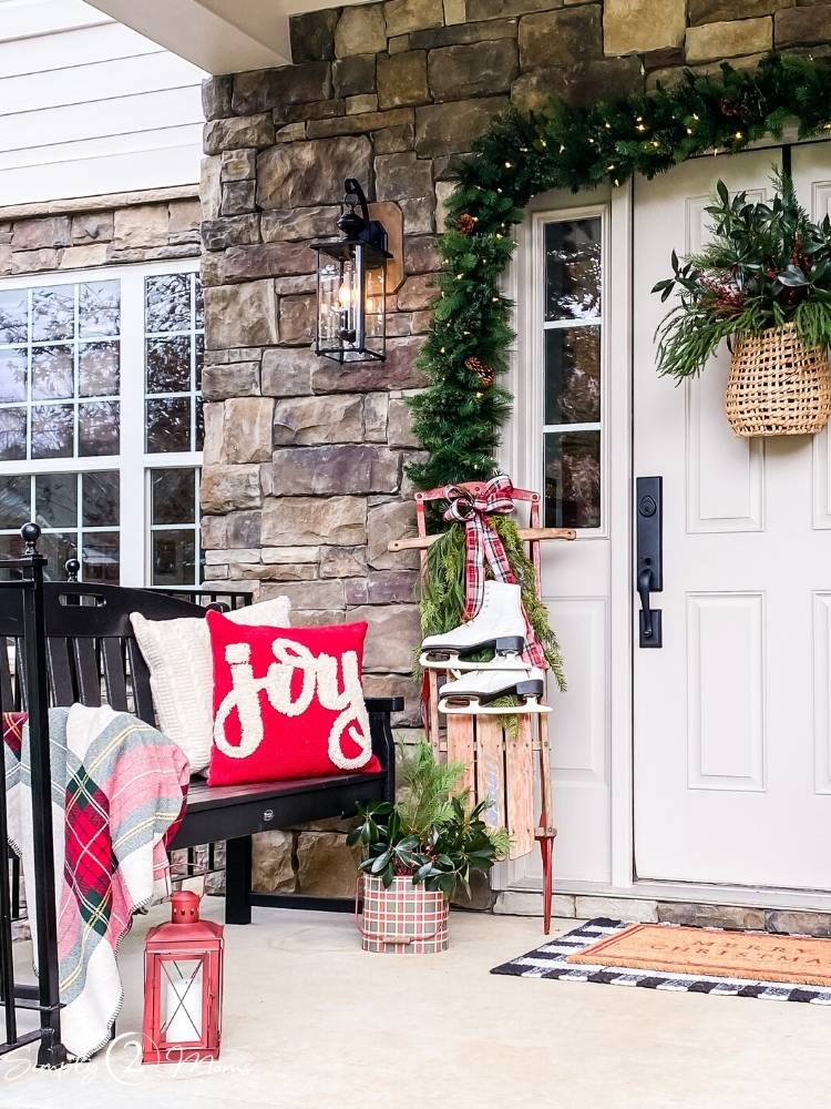 Charming Farmhouse Porch Vignette with Vintage Sled and Skates — Farmhouse Christmas Porch
