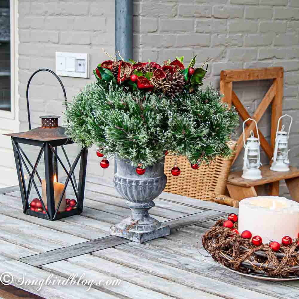 Rustic Garden Table with Urn Centerpiece and Lantern — Rustic Christmas Decor