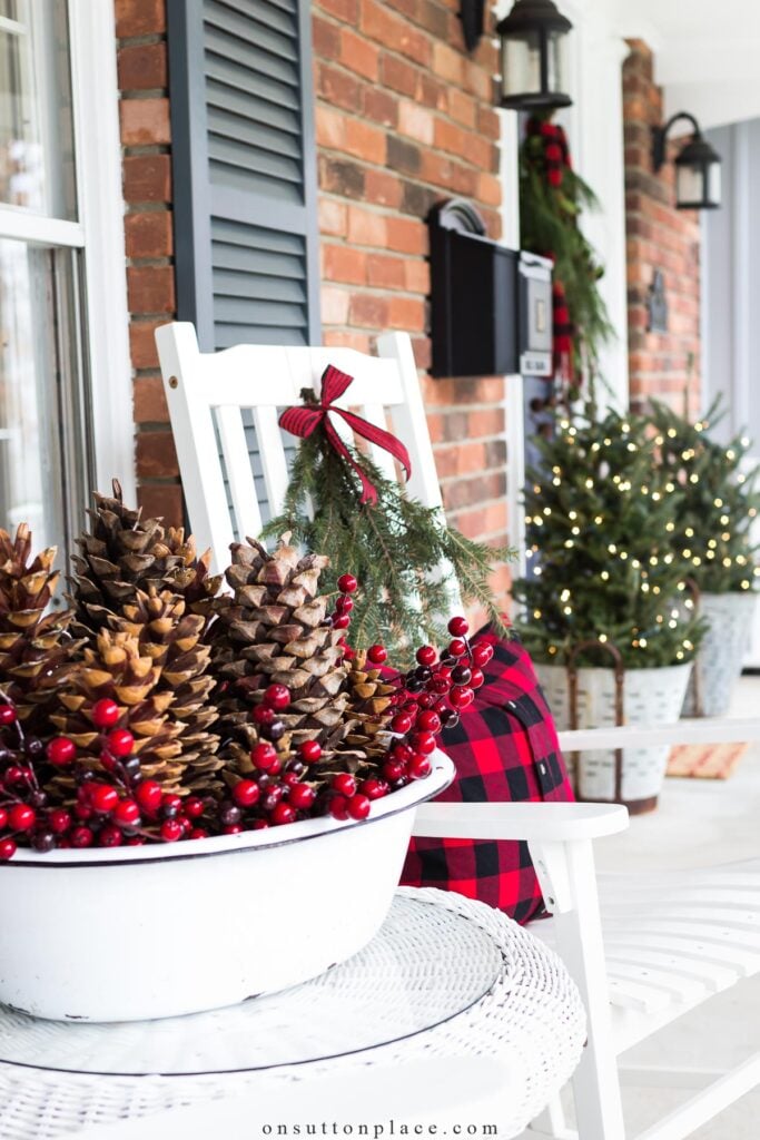 Rustic Porch Vignette with Pinecone and Berry Arrangement — Christmas Porch Decor