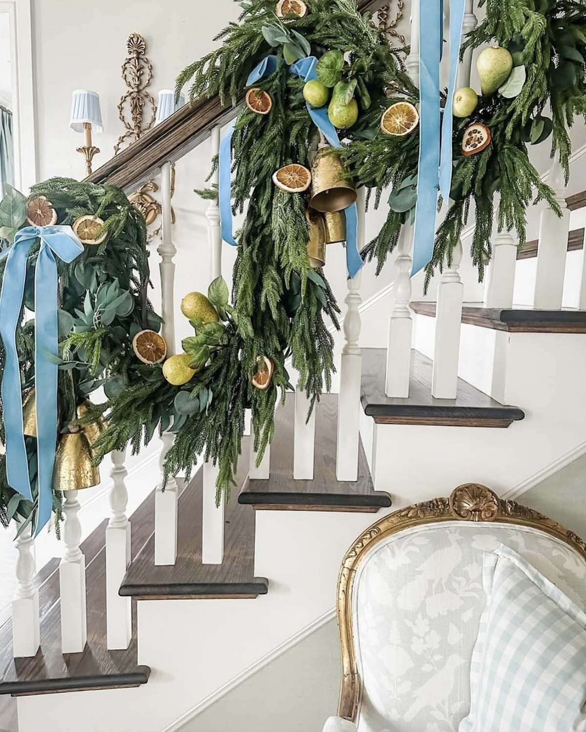 Unique Garland with Dried Fruit, Oranges, and Blue Velvet Ribbon Unique Garland with Dried Fruit, Oranges, and Blue Velvet Ribbon — Christmas Staircase Decor