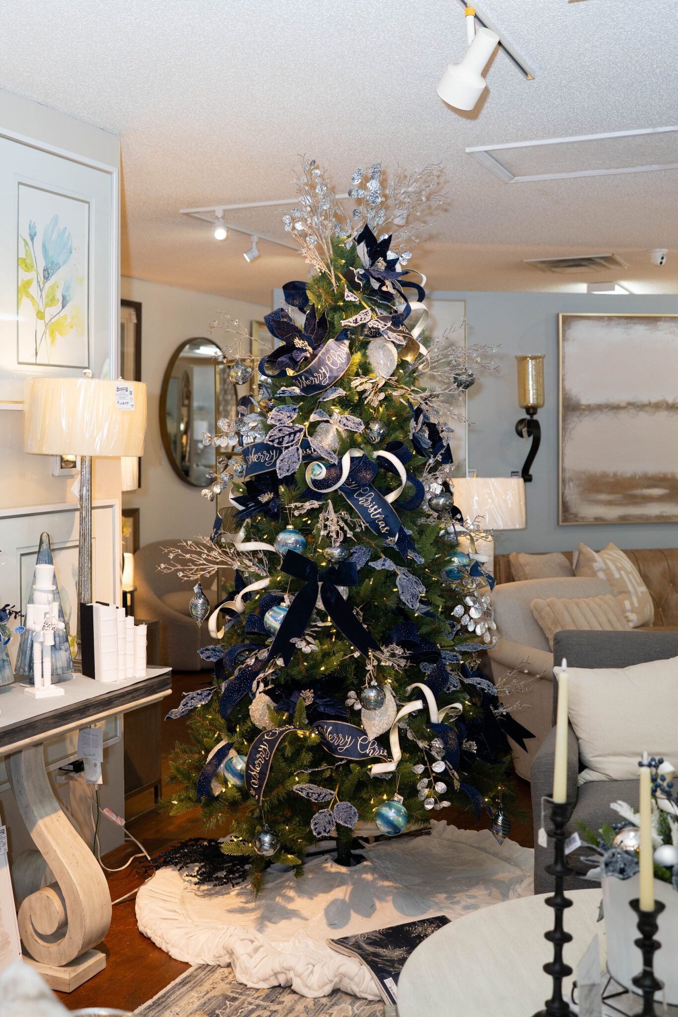 Navy Blue Ribbons Adorning a Festive Christmas Tree — Blue Christmas Decor