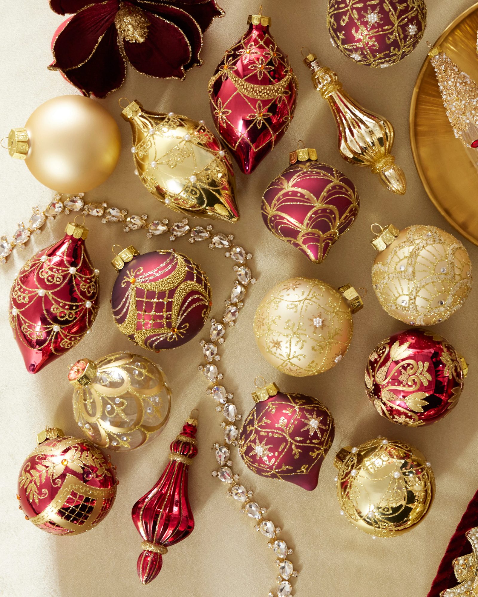Elegant Flat Lay of Burgundy, Gold, and Red Christmas Ornaments Elegant Flat Lay of Burgundy, Gold, and Red Christmas Ornaments — Christmas Decor