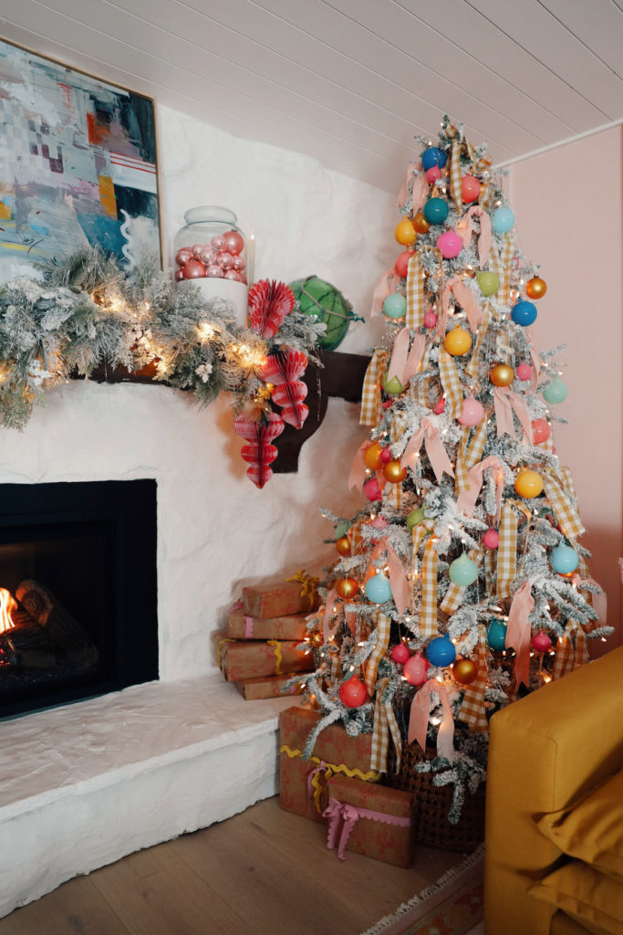 Vibrant Flocked Christmas Tree with Pastel Ornaments and Gingham Ribbon Vibrant Flocked Christmas Tree with Pastel Ornaments and Gingham Ribbon — Whimsical Christmas Decor