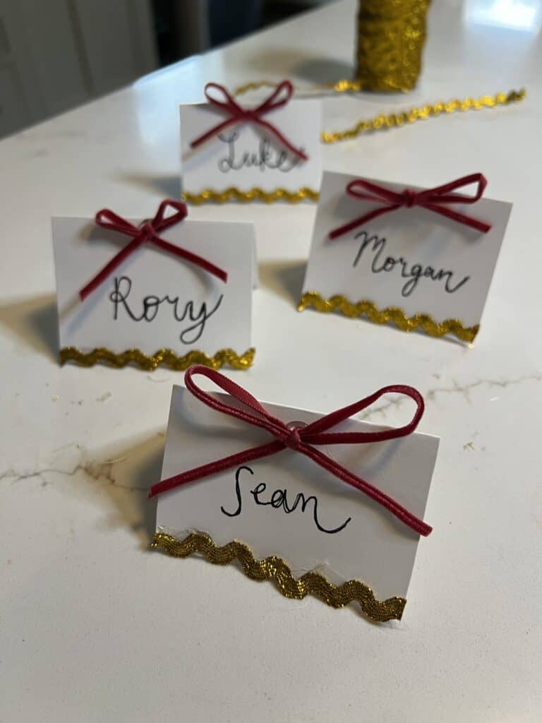 Handmade Red Ribbon Bow Place Cards Handmade Red Ribbon Bow Place Cards — Christmas Place Cards