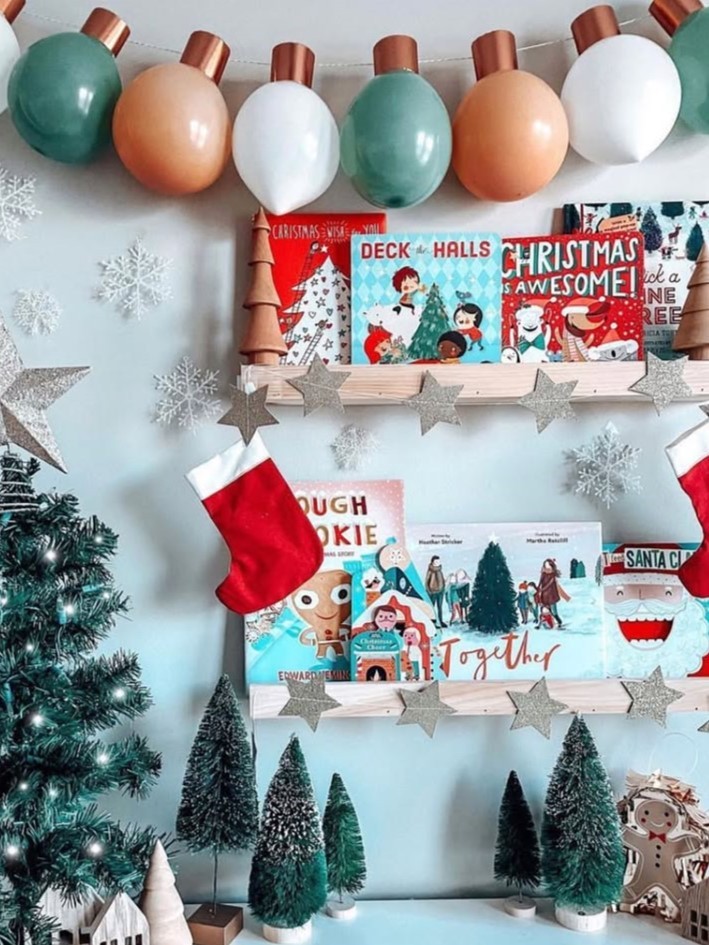 Playful Bookshelf with Colorful Christmas Books and Stockings Playful Bookshelf with Colorful Christmas Books and Stockings — Christmas Bookshelf Decor