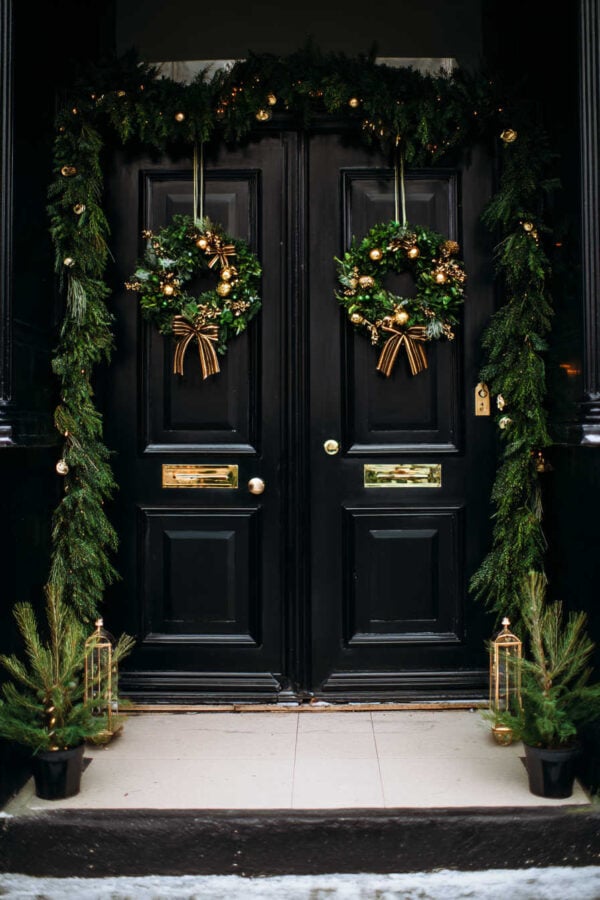 Elegant Double Doors with Lush Wreaths and Gold Accents Elegant Double Doors with Lush Wreaths and Gold Accents — Christmas Front Door Decor