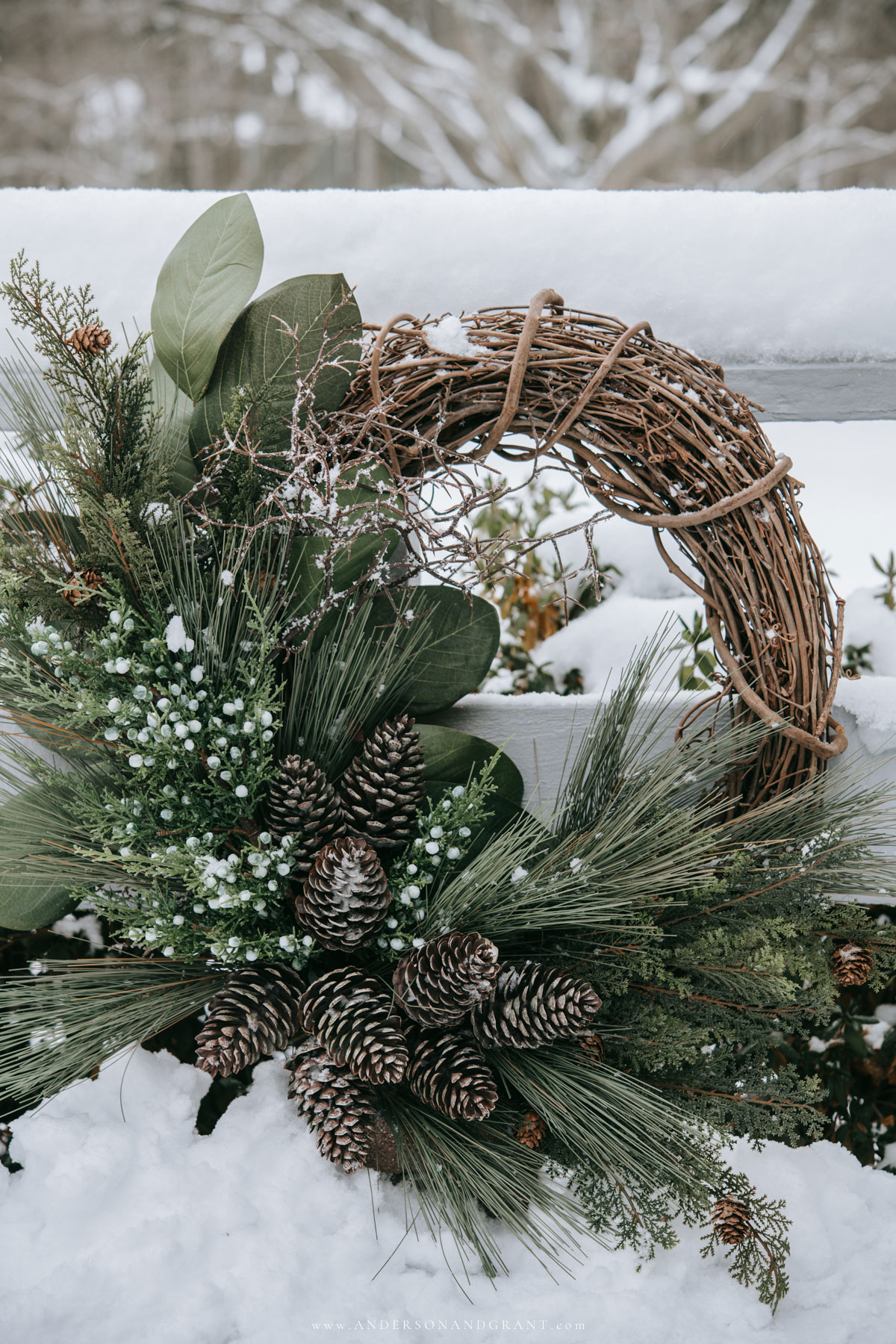 Natural Wreath on a Snow-Covered Fence Natural Wreath on a Snow-Covered Fence — Christmas Wreath