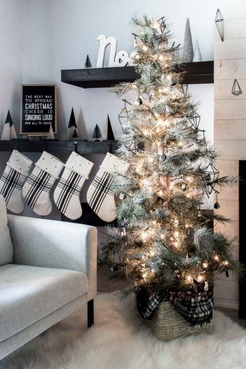 Cozy Corner Tree with Graphic Stockings and Neutral Palette — Minimalist Christmas Tree