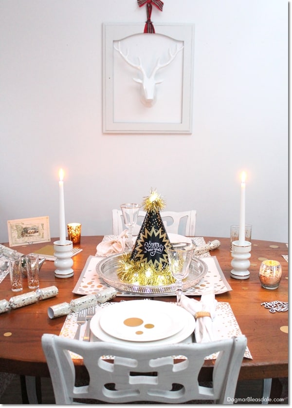 Festive Dining Table with Black and Gold Party Hat Centerpiece Festive Dining Table with Black and Gold Party Hat Centerpiece — New Years Eve Party 2027