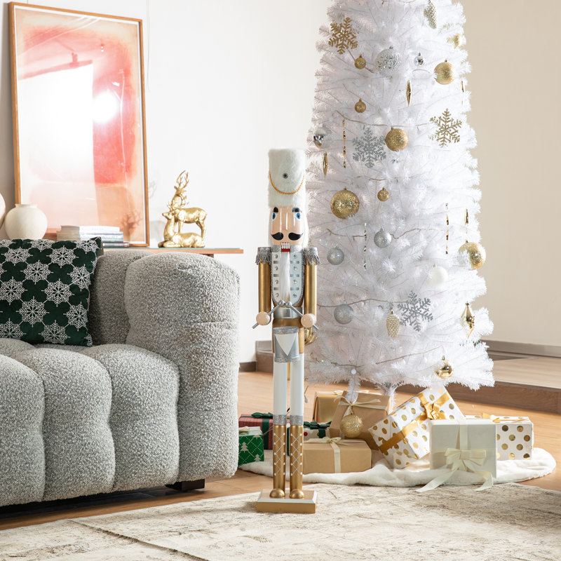 Modern White Tree with a Gold Nutcracker Figure Modern White Tree with a Gold Nutcracker Figure — Nutcracker Christmas Tree
