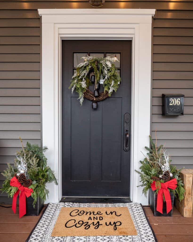 Modern Black Door with Symmetrical Wreath and Mini Trees Modern Black Door with Symmetrical Wreath and Mini Trees — Small Christmas Porch