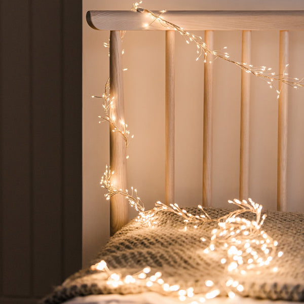 Minimalist Wooden Headboard Accented with Delicate Fairy Lights — Christmas Fairy Lights Headboard