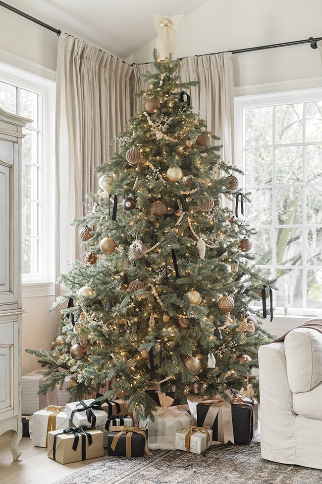 Classic Neutral Christmas Tree with Gold, Brown, and Black Ornaments