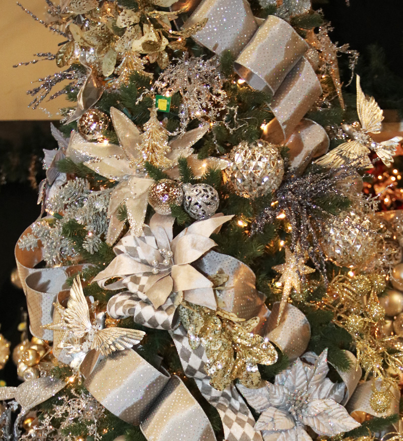 Adorn a Christmas tree with abundant gold and silver embellishments Adorn a Christmas tree with abundant gold and silver embellishments — Gold Christmas Decor