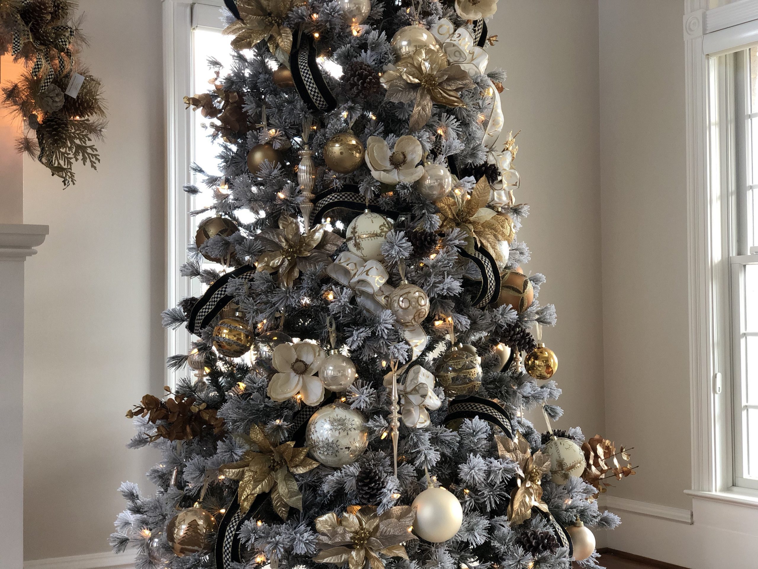 Glamorous Flocked Tree with Black and White Ribbon and Metallic Accents — Vertical Ribbon Christmas Tree