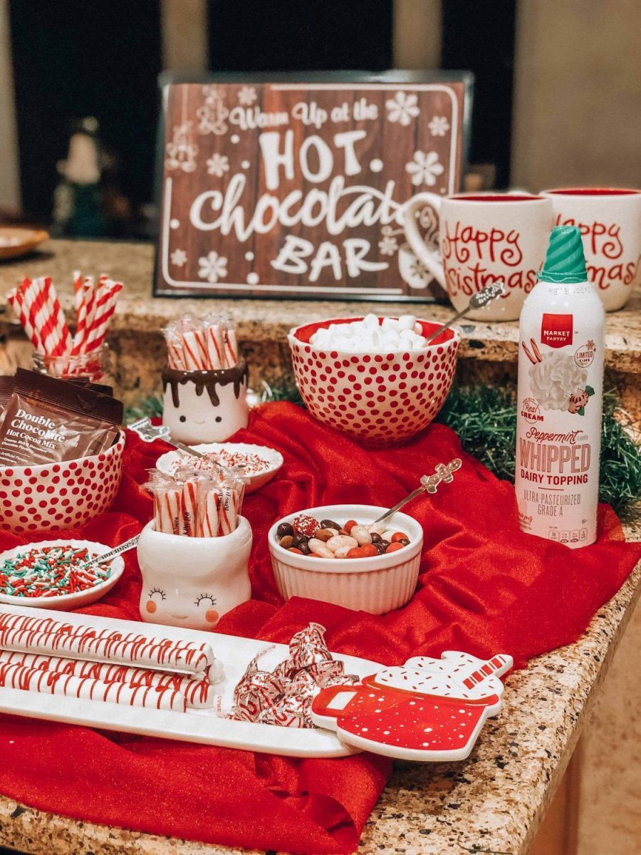Extensive Hot Cocoa Bar with Red Velvet Draping and Toppings Extensive Hot Cocoa Bar with Red Velvet Draping and Toppings — Christmas Hot Cocoa Bar