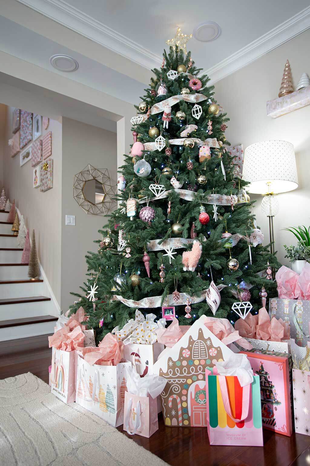 A Grand Pink Christmas Tree Takes Center Stage in an Eclectic Living Room A Grand Pink Christmas Tree Takes Center Stage in an Eclectic Living Room — Pink Christmas Decor