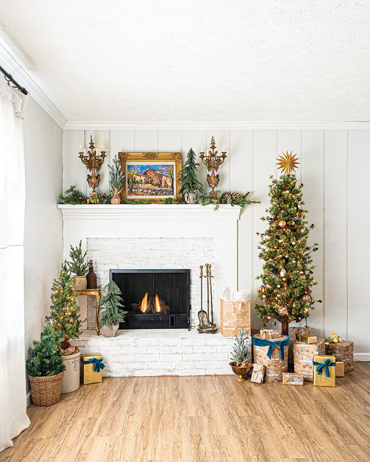 Symmetrical Farmhouse Christmas Trees Flanking a Fireplace