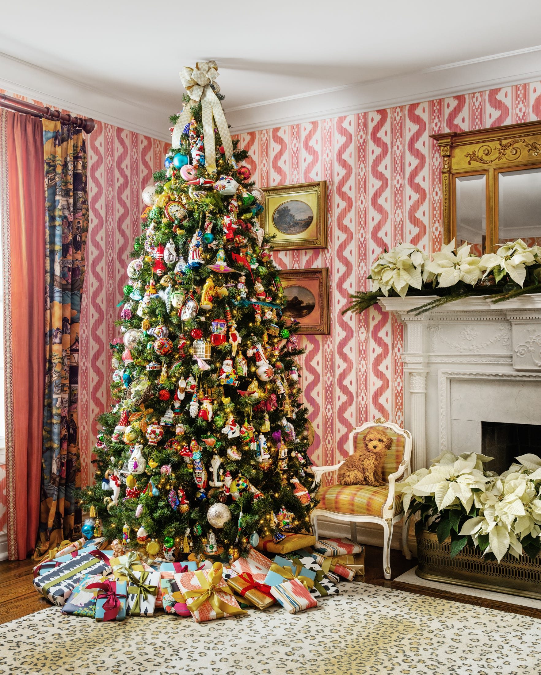 Living Room with Pink Wallpaper, Tree, and Poinsettias Living Room with Pink Wallpaper, Tree, and Poinsettias — Traditional Christmas Decor