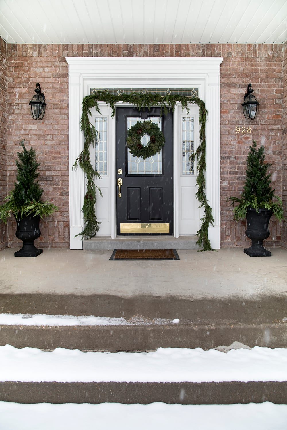Traditional Black Door with Cedar Garland and Pine Wreath — Christmas House Exterior Decor