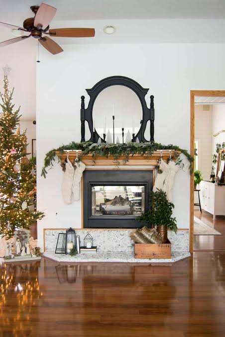 Farmhouse Mantel with Black Mirror and Minimalist Lanterns Farmhouse Mantel with Black Mirror and Minimalist Lanterns — Farmhouse Christmas Mantel