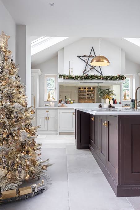 Modern Luxury Kitchen Anchored by a Grand Decorated Christmas Tree Modern Luxury Kitchen Anchored by a Grand Decorated Christmas Tree — Christmas Kitchen Decor