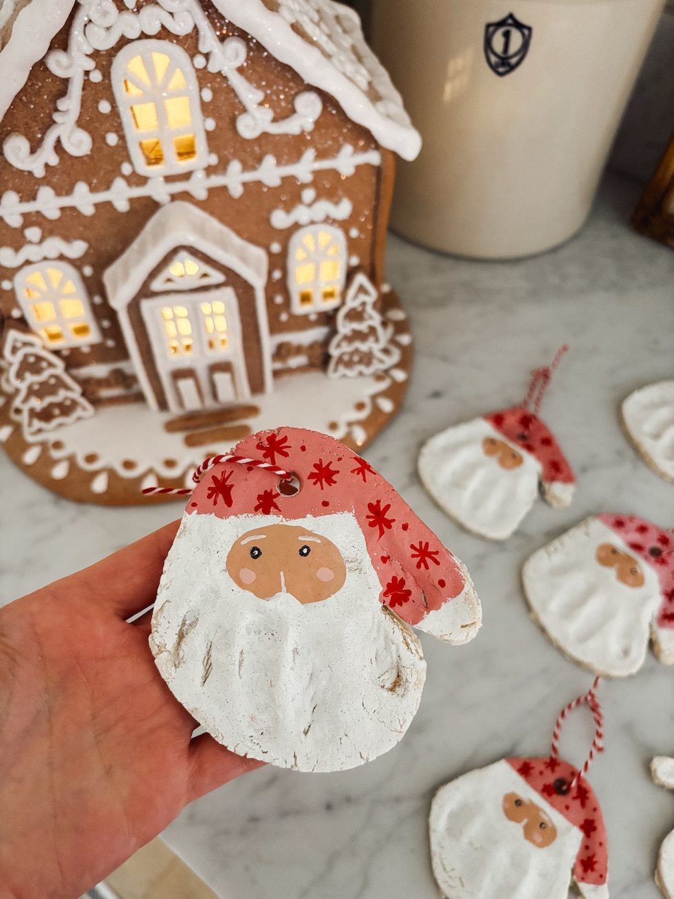 Whimsical Santa Face Ornament on Marble Countertop Whimsical Santa Face Ornament on Marble Countertop — Salt Dough Ornaments