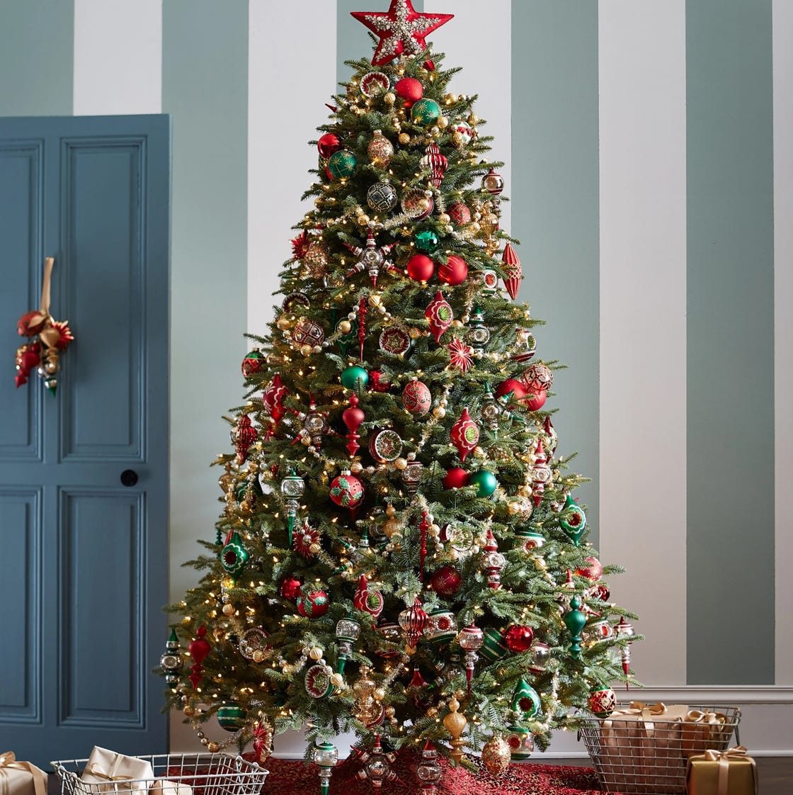 Traditional Living Room with Blue Accents and Striped Walls Traditional Living Room with Blue Accents and Striped Walls — Christmas Tree Trends 2026
