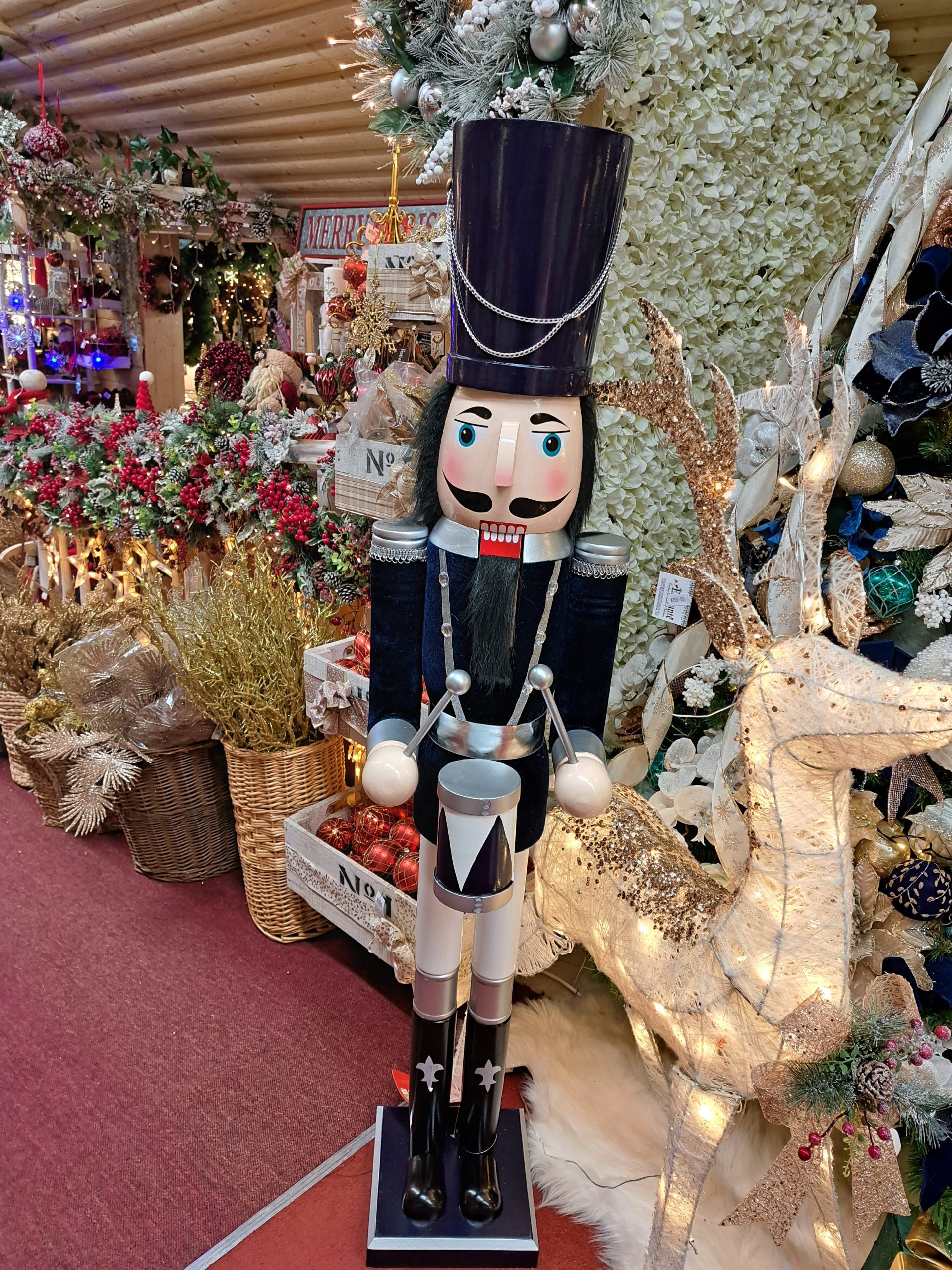 Imposing Navy Nutcracker in Garden Centre Display — Nutcracker Display