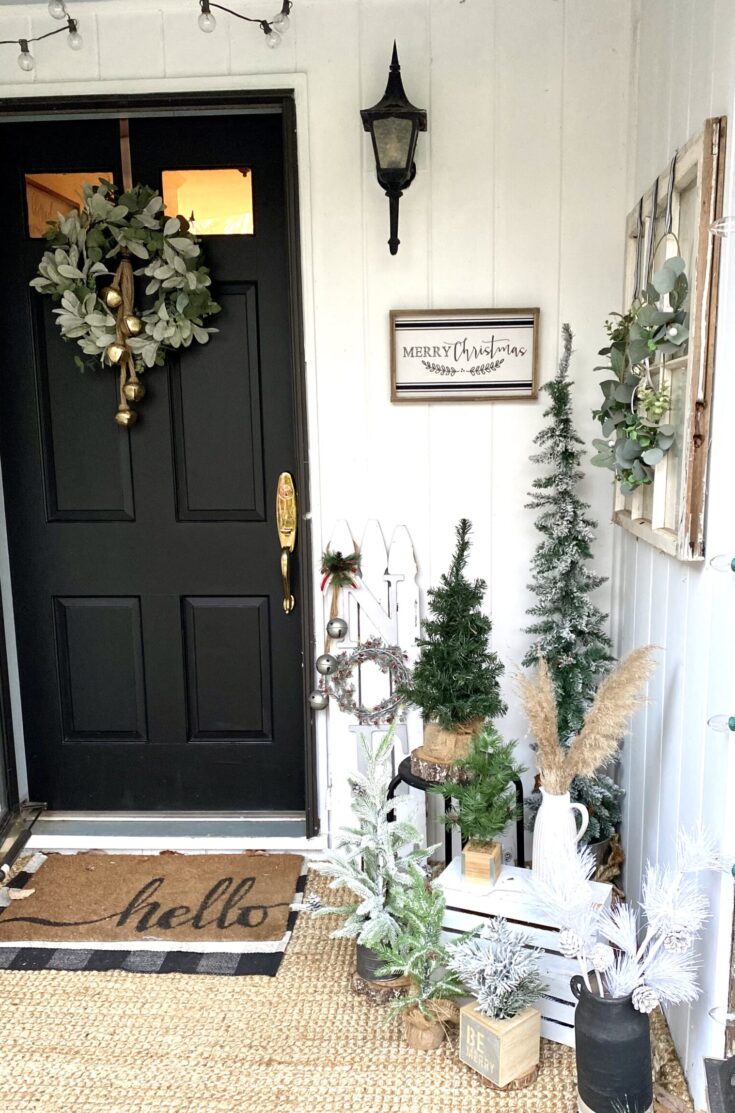 Inviting Farmhouse Porch with Black Door, Wreath, and Rustic Sign — Farmhouse Christmas Porch