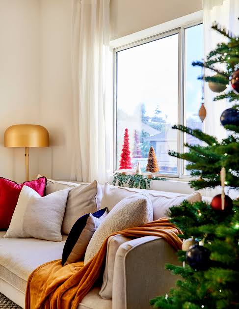 Modern Sofa with Festive Pillows and Trees — Christmas Apartment Decor