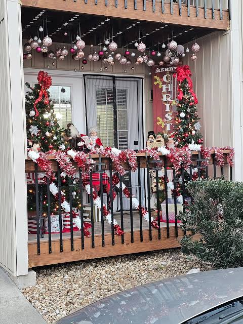 Vibrant Balcony with Abundant Ornaments and Lights Vibrant Balcony with Abundant Ornaments and Lights — Christmas Balcony Decor