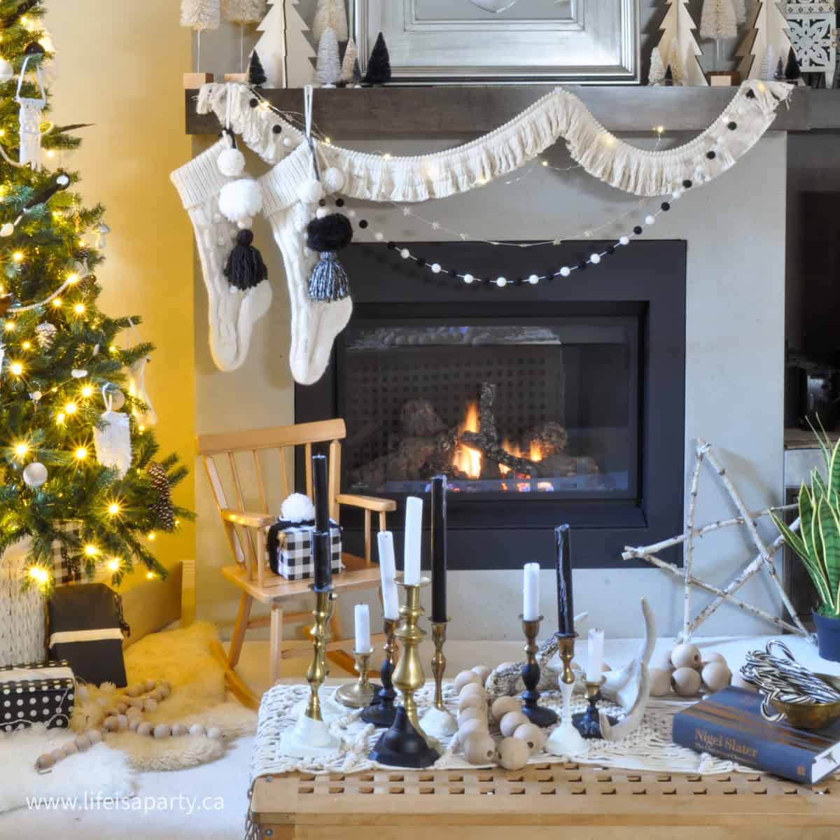 Boho Living Room Fireplace Mantel with White Knit Stockings Boho Living Room Fireplace Mantel with White Knit Stockings — White Christmas Decor