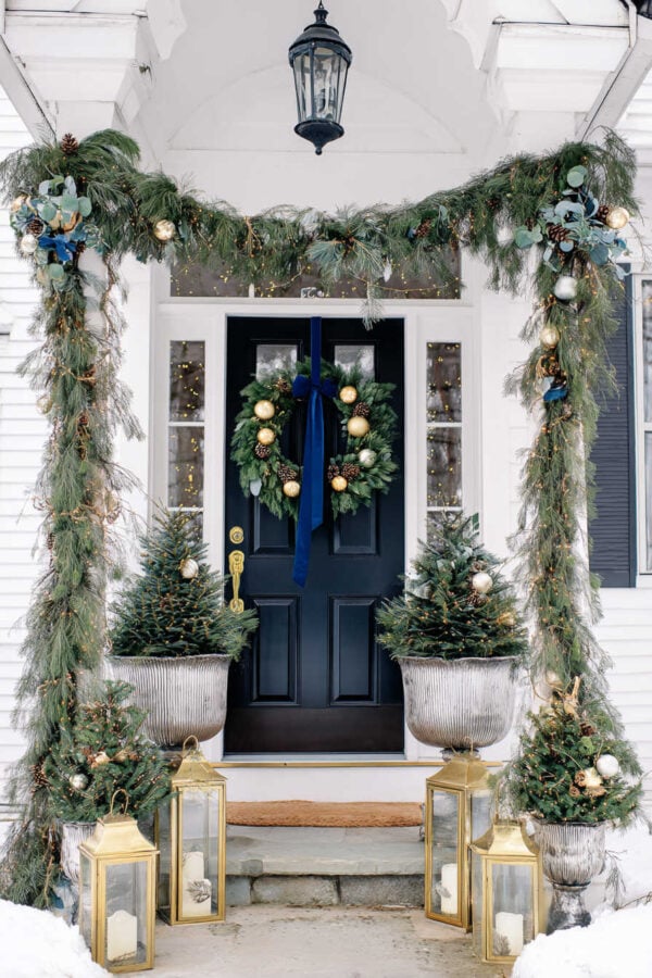 Elegant Entrance with Lush Evergreen Garlands and Urns Elegant Entrance with Lush Evergreen Garlands and Urns — Small Christmas Porch