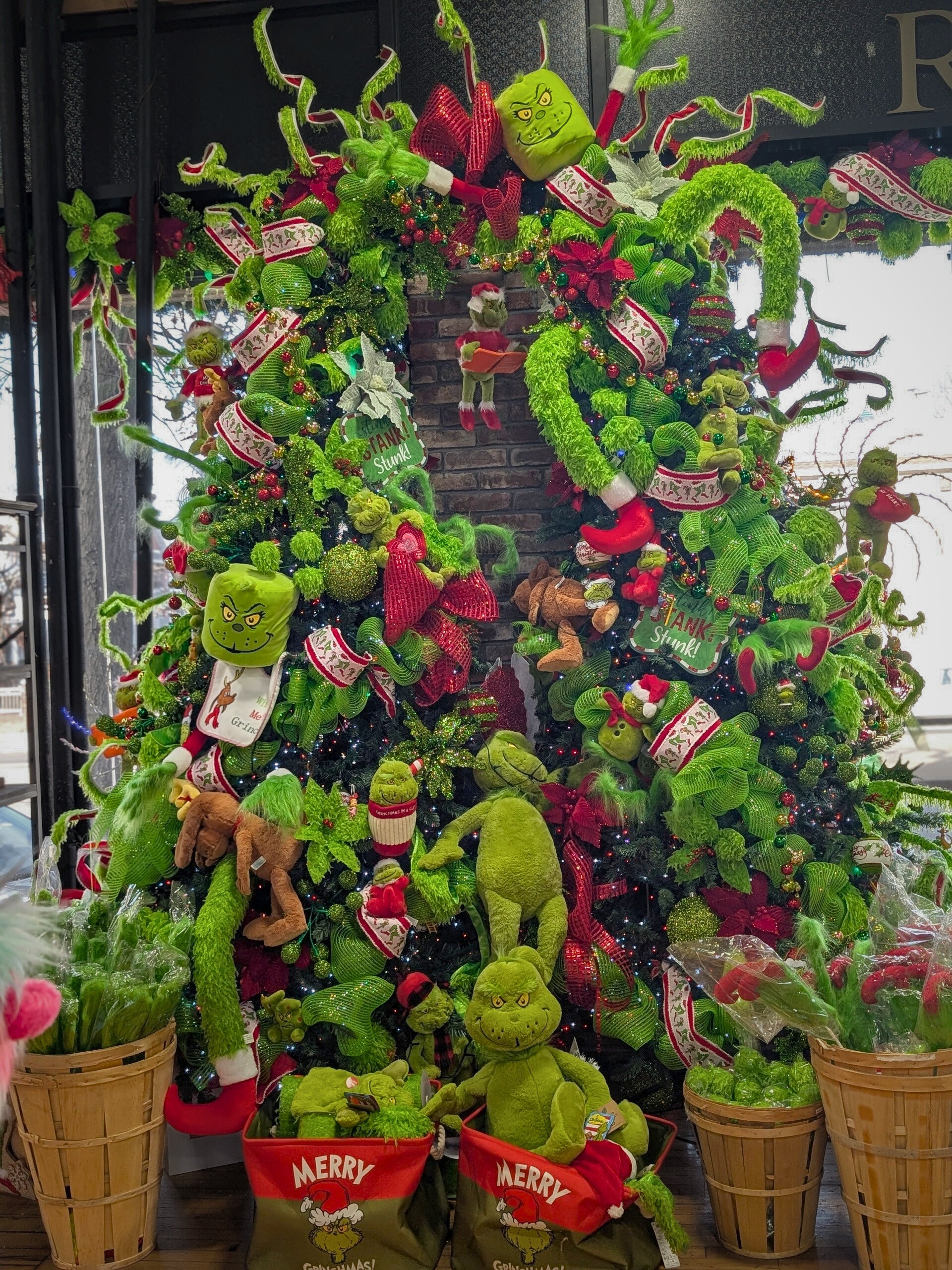 Pair of Large Grinch Christmas Trees in Display Pair of Large Grinch Christmas Trees in Display