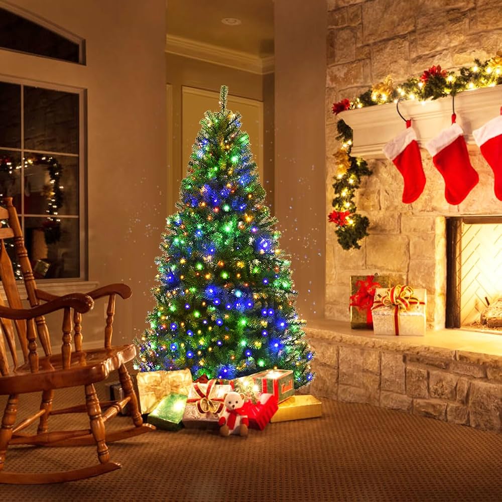 Traditional Living Room Tree Near a Stone Fireplace Traditional Living Room Tree Near a Stone Fireplace — Christmas Tree with Colored Lights