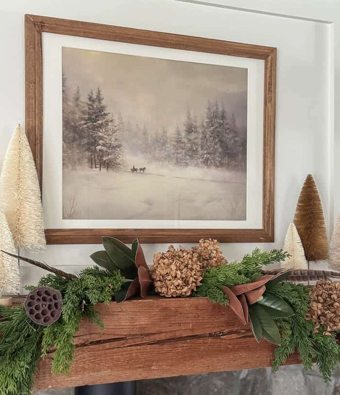 Farmhouse Mantel with Natural Garland and Bottle Brush Trees Farmhouse Mantel with Natural Garland and Bottle Brush Trees — Christmas Fireplace Decor