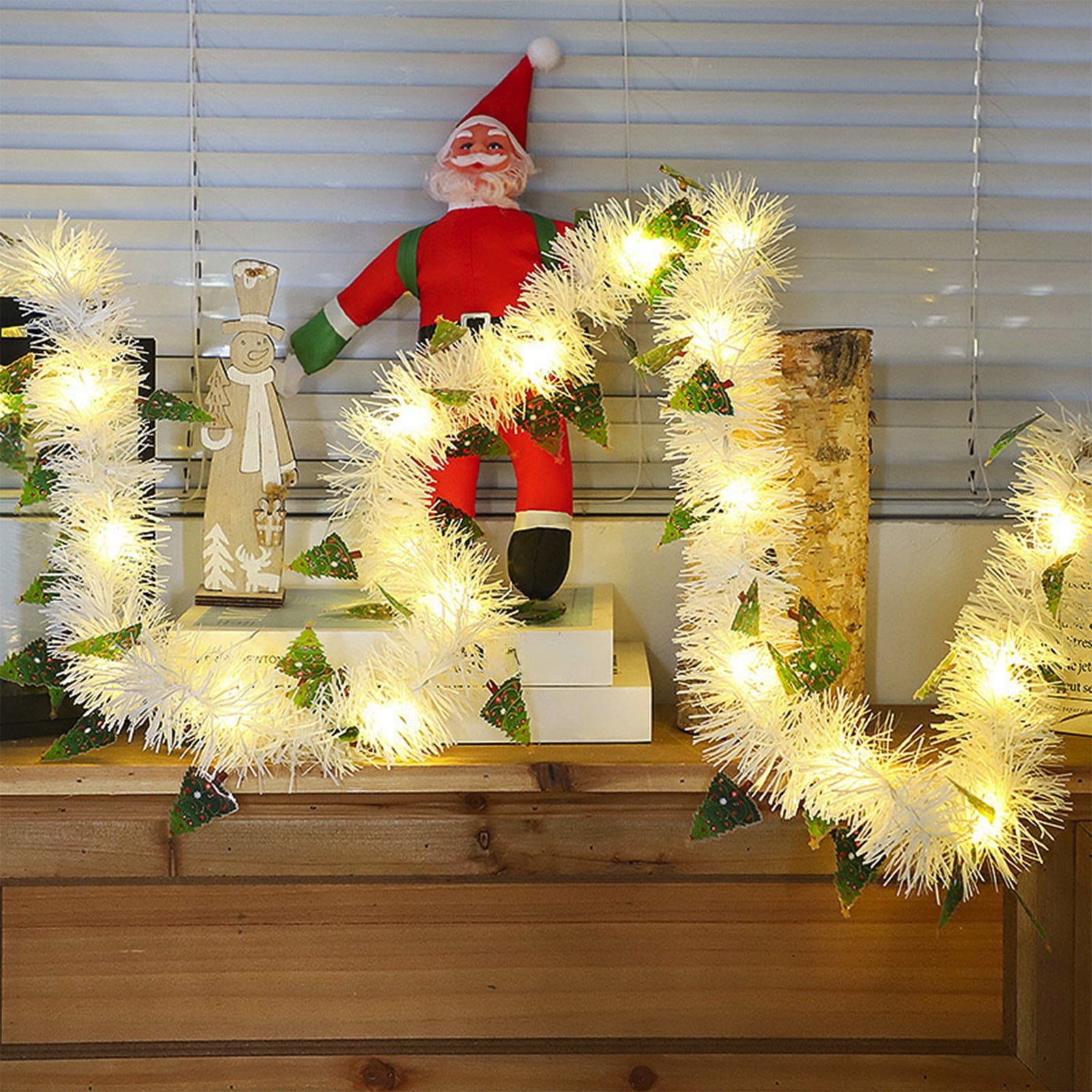 White Tinsel Garland with Embedded Lights and Figures White Tinsel Garland with Embedded Lights and Figures — Christmas Lights in Garland Indoor