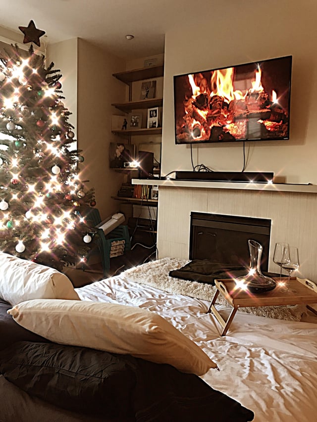 Cozy Bedroom with Glowing Tree and Fireplace — Christmas Apartment Decor