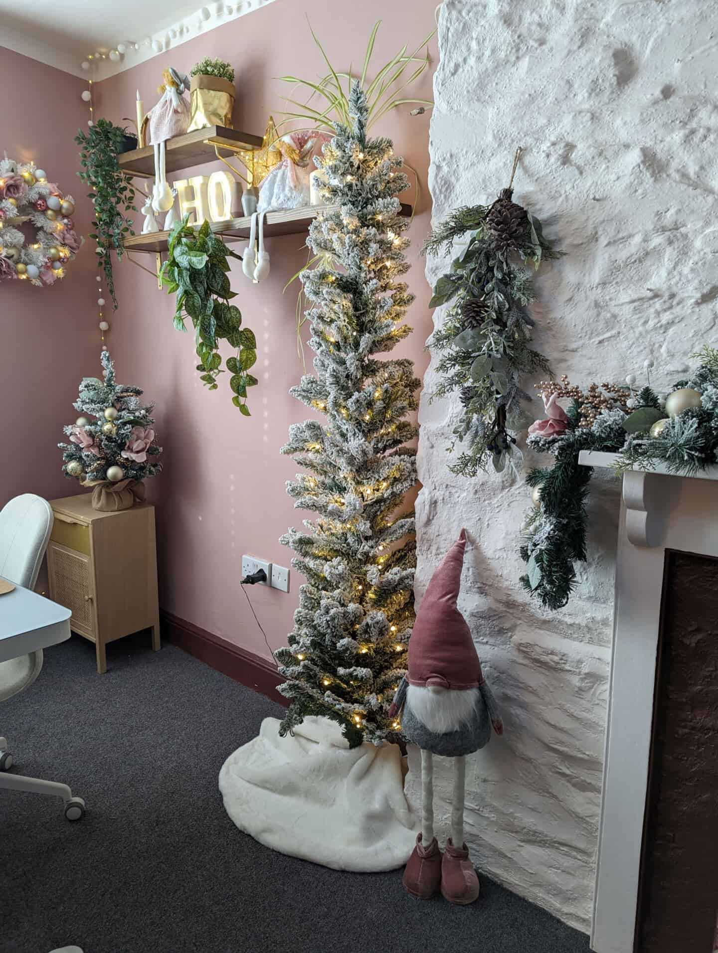 Cozy Corner with Tall Flocked Christmas Tree and Pink Walls Cozy Corner with Tall Flocked Christmas Tree and Pink Walls — Christmas Home Office Decor