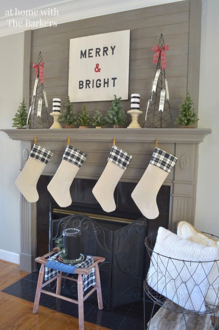 Farmhouse Plaid Stockings Above a Fireplace — Christmas Stockings Display